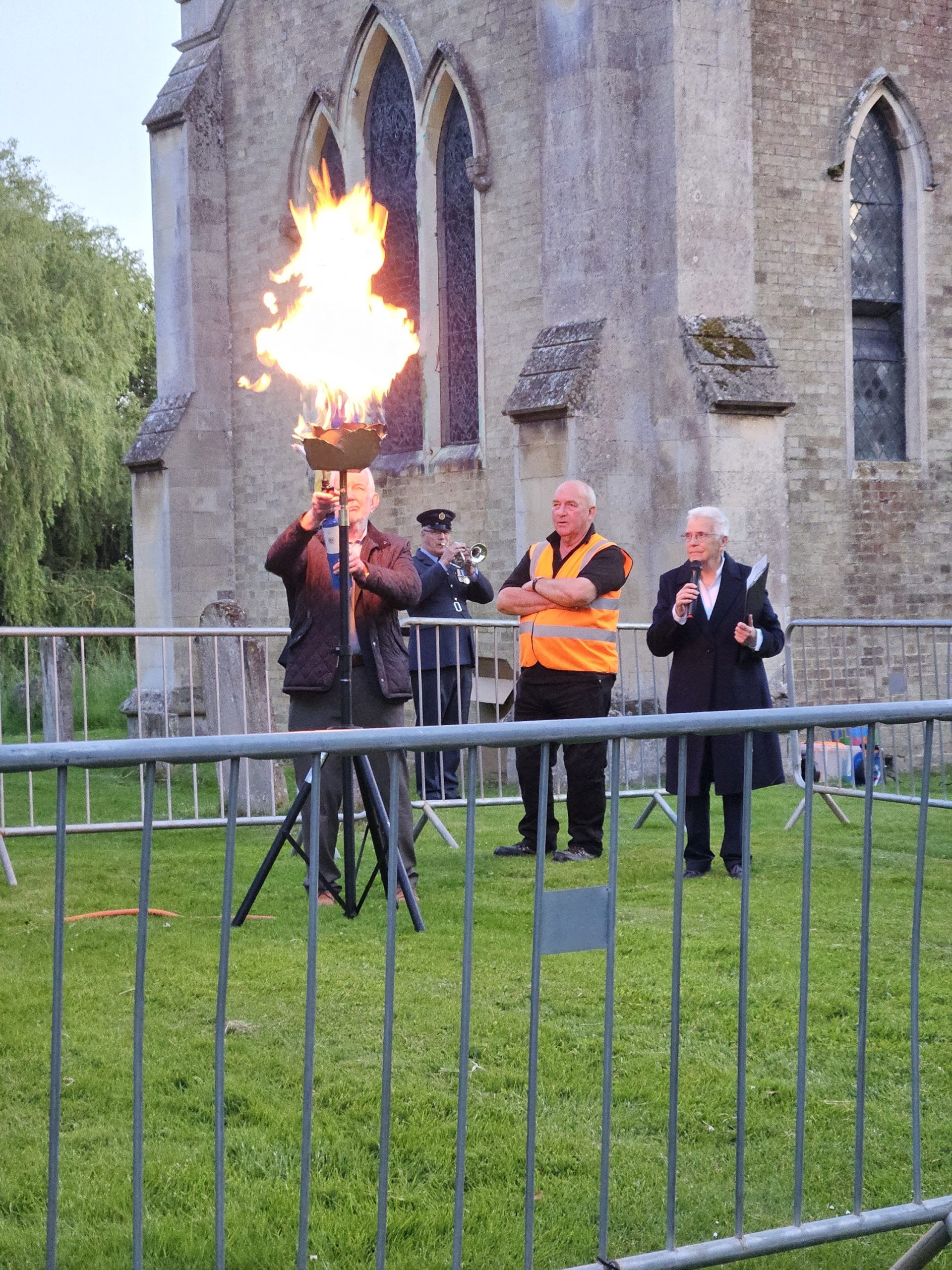 Freeman, Roy Reeves lighting the Beacon alongside the Chairman of Warboys Parish Council.